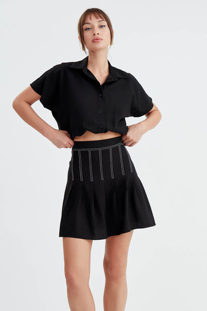 PLEATED MINI-SKIRT
