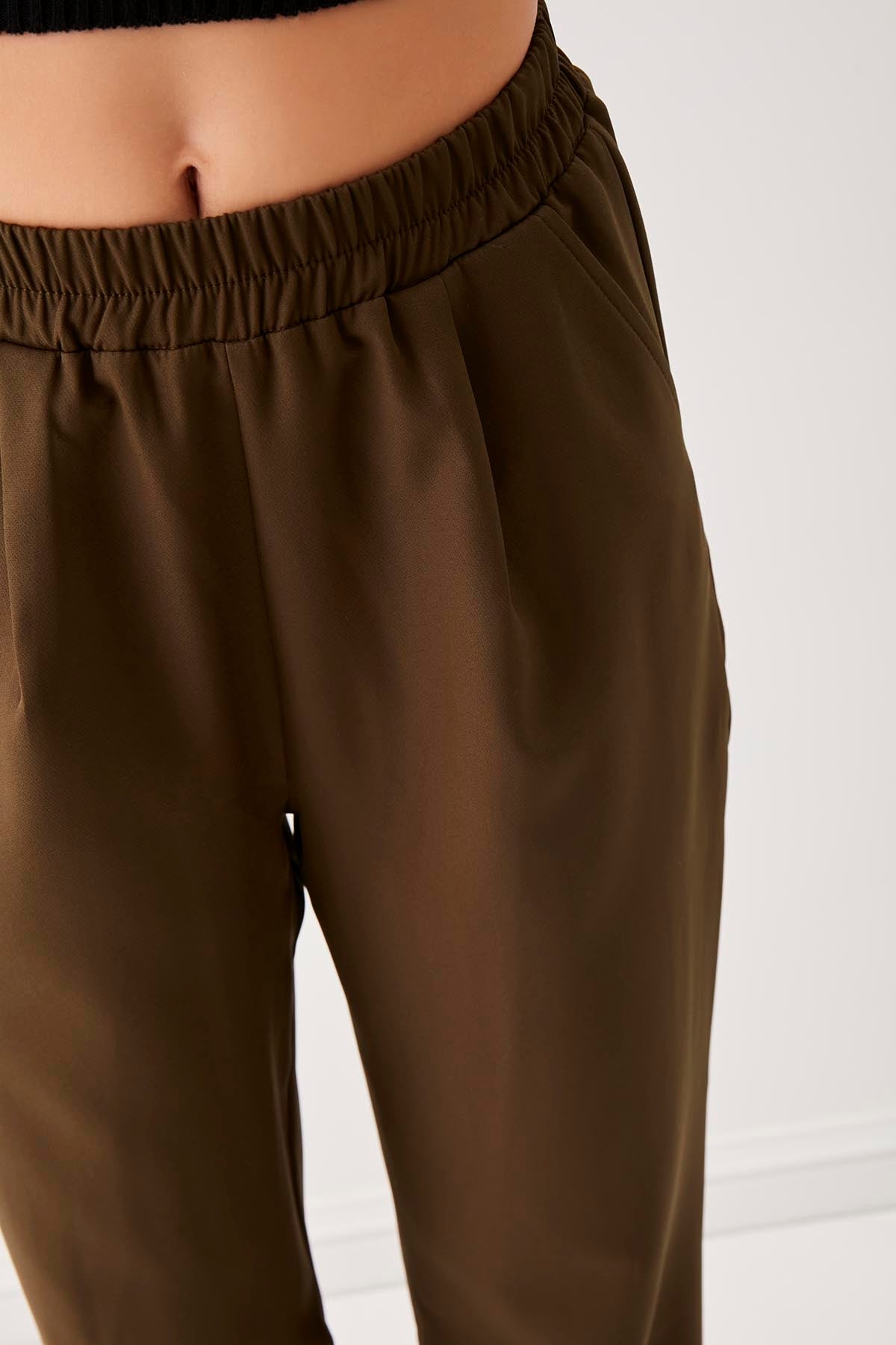 PLEATED TROUSERS