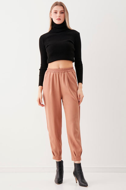 PLEATED TROUSERS