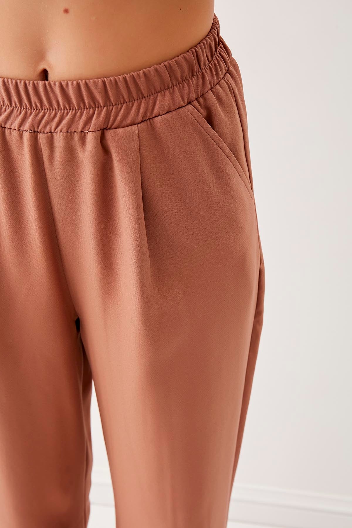 PLEATED TROUSERS