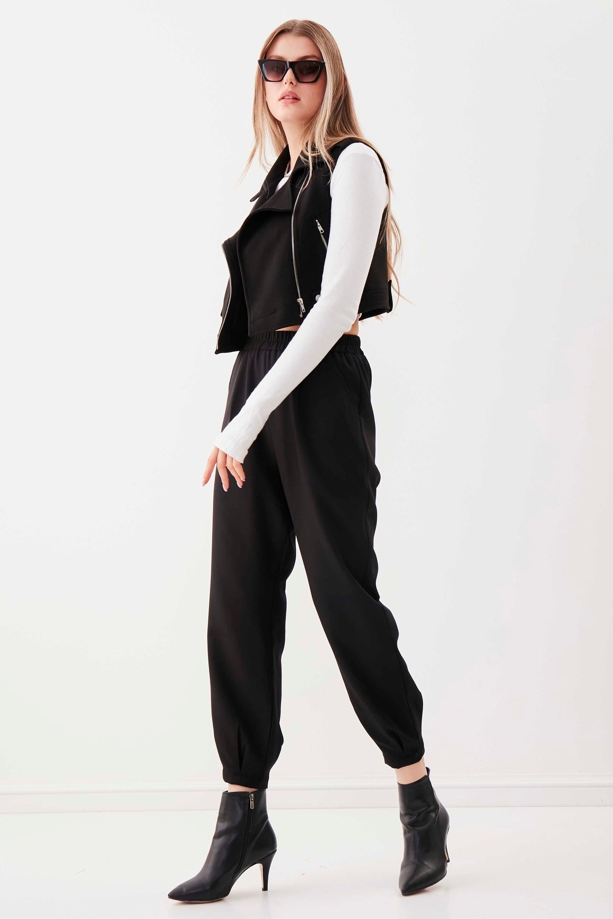 PLEATED TROUSERS