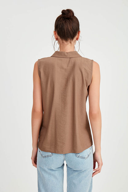 SLEEVELESS COLLAR FRONT BUTTON BLOUSE