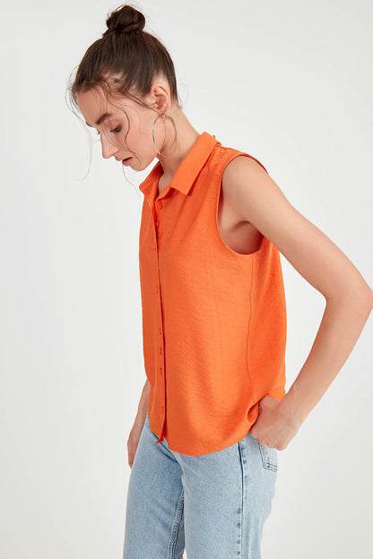 SLEEVELESS COLLAR FRONT BUTTON BLOUSE