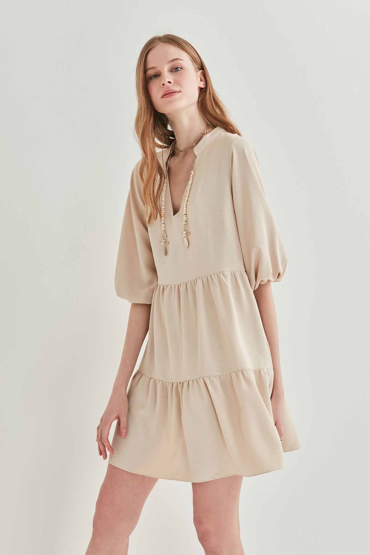 V COLLAR BUBBLE SLEEVE WIDE SECTOR DRESS