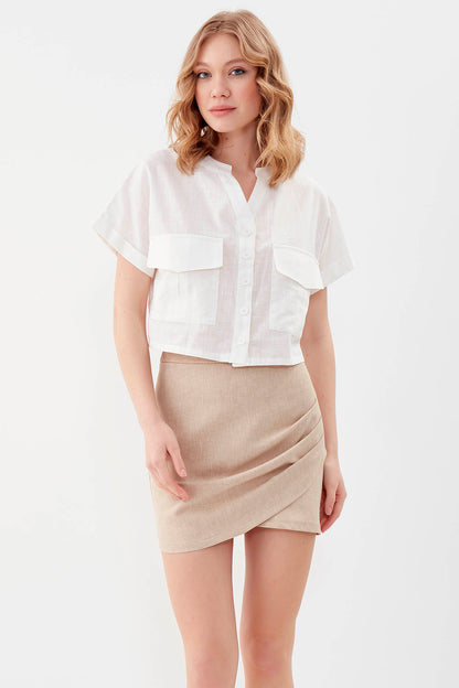 MINI-SKIRT WITH THE BRUSTS