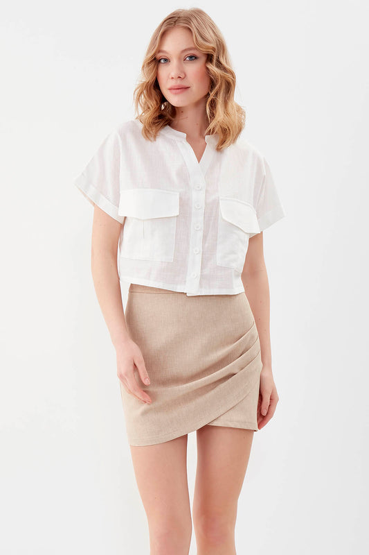 MINI-SKIRT WITH THE BRUSTS