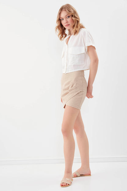 MINI-SKIRT WITH THE BRUSTS