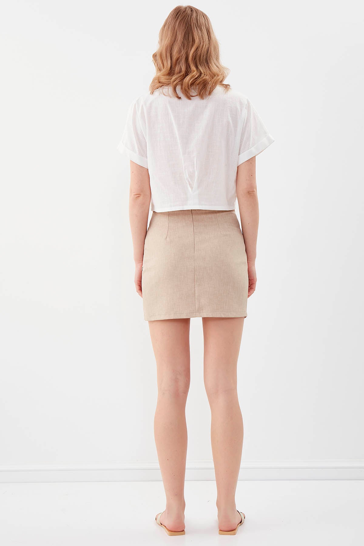 MINI-SKIRT WITH THE BRUSTS