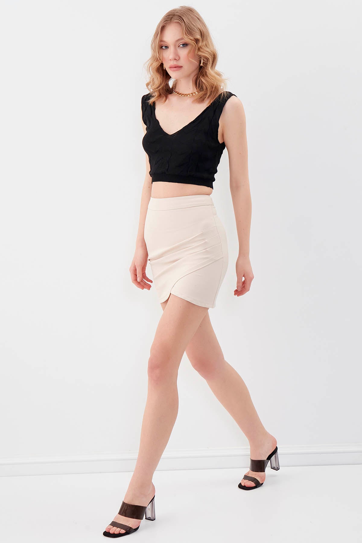 MINI-SKIRT WITH THE BRUSTS