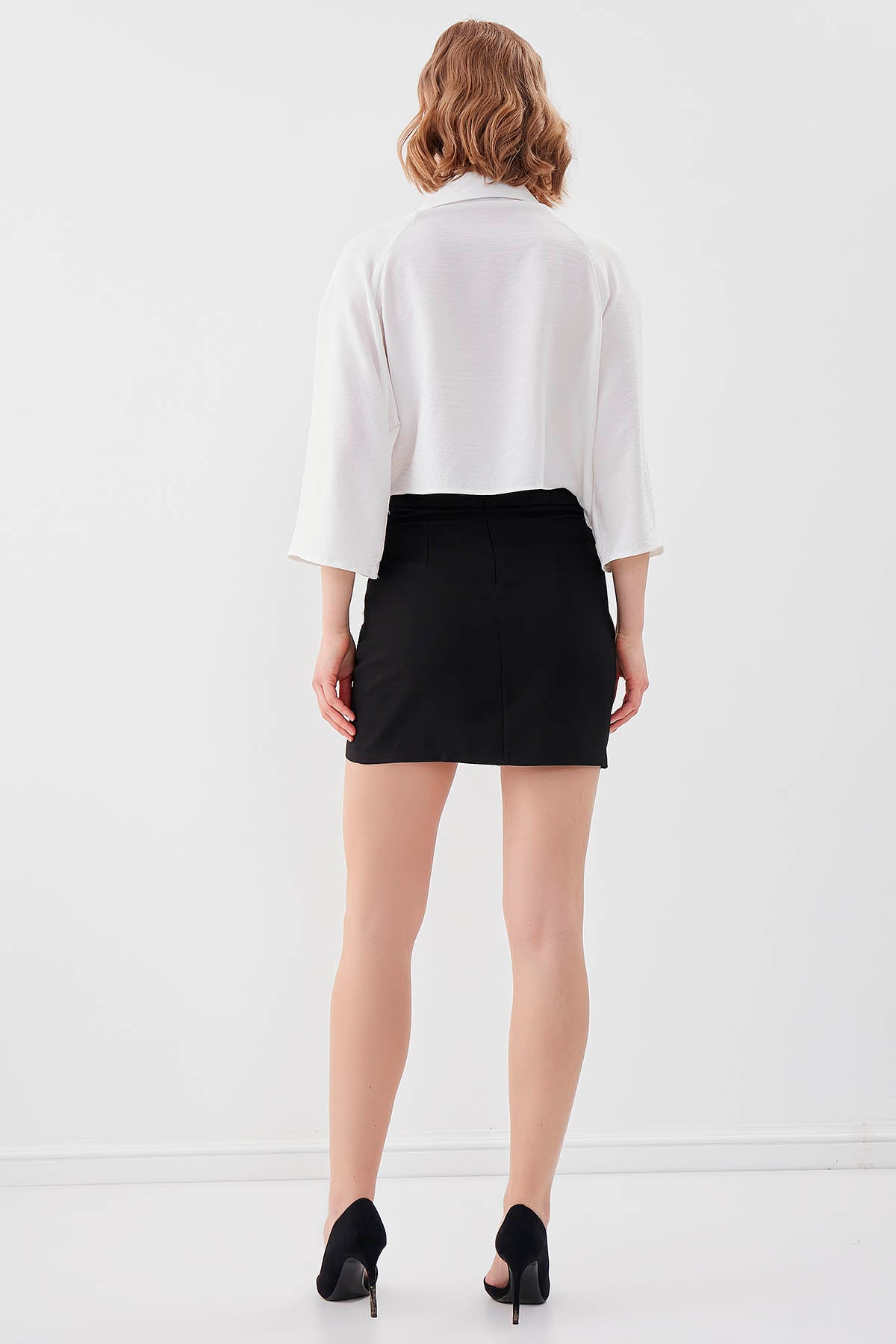 MINI-SKIRT WITH THE BRUSTS