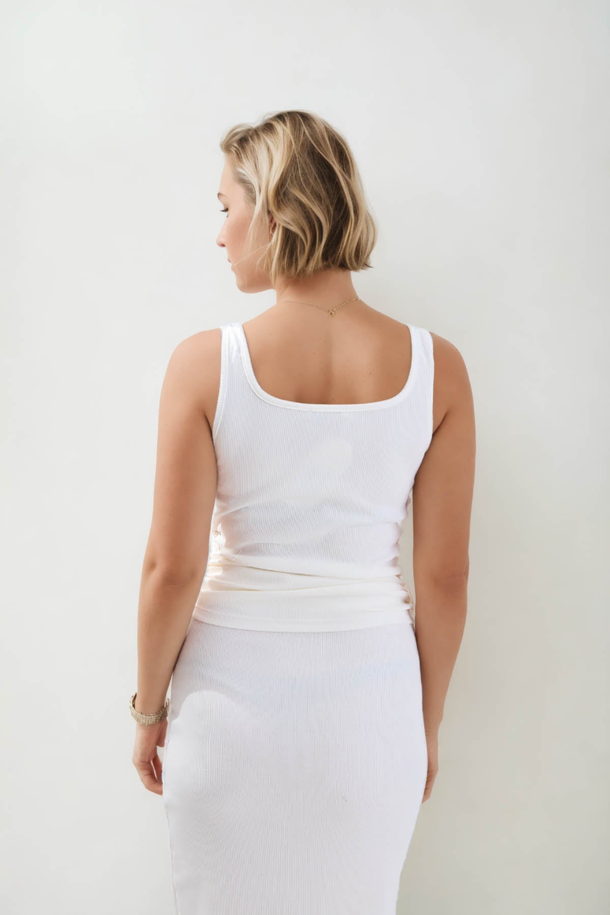 SLEEVELESS BLOUSE WITH RUBBED SIDES